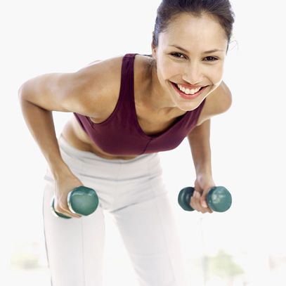 close-up of a woman exercising with dumbbells